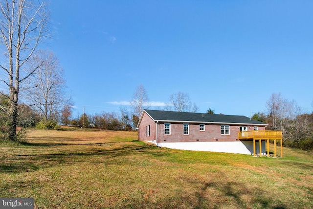 19196 Ferguson Ln, Jeffersonton, VA 22724 - rear view of house featuring a yard, a patio area, brick siding, and a deck