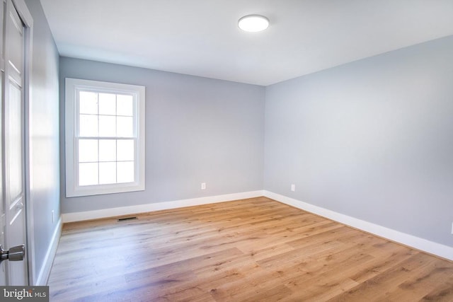 19196 Ferguson Ln, Jeffersonton, VA 22724 - unfurnished room featuring visible vents, wood finished floors, and baseboards