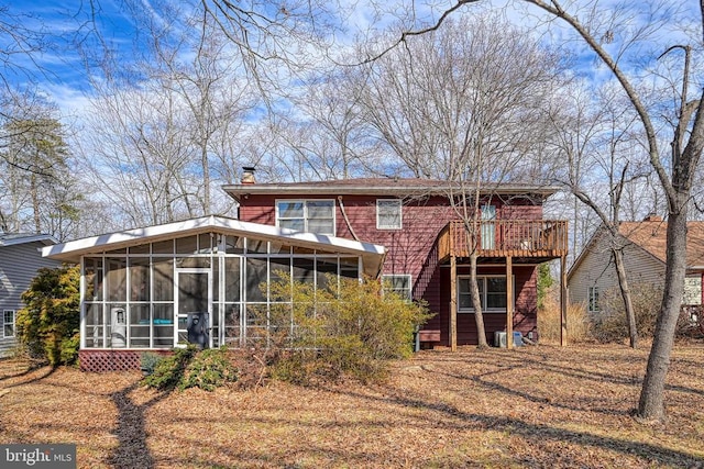119 Birchside Cir, Locust Grove, VA 22508 - back of property with a sunroom and a chimney