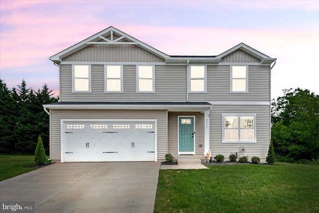 traditional home with a garage, a front lawn, driveway, and board and batten siding