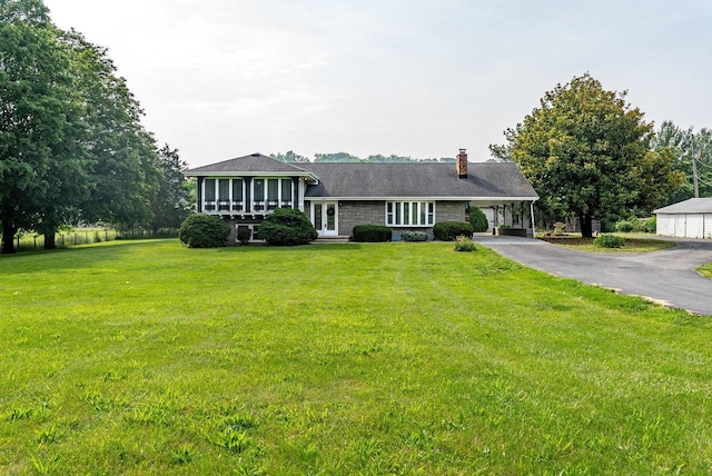 4490 N Valley Pike, Rockingham, VA 22802 - tri-level home with a chimney, driveway, a front lawn, a carport, and stone siding