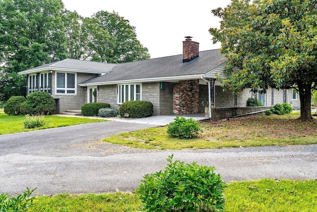 4490 N Valley Pike, Rockingham, VA 22802 - view of front of house with a chimney, stone siding, and driveway