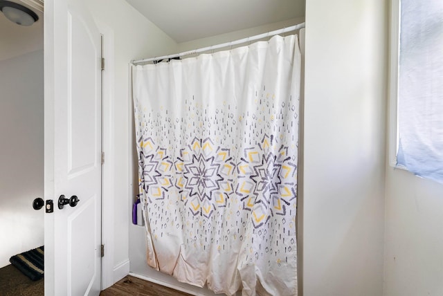 250 Washington Ave W, Elkton, VA 22827 - bathroom with a shower with curtain and wood finished floors