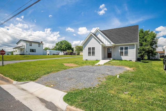 250 Washington Ave W, Elkton, VA 22827 - view of front of house featuring crawl space, board and batten siding, and a front lawn