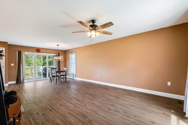 250 Washington Ave W, Elkton, VA 22827 - living room with baseboards, wood finished floors, and a ceiling fan