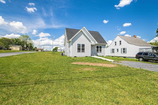 250 Washington Ave W, Elkton, VA 22827 - view of front of house featuring a front lawn, crawl space, central AC, and a shingled roof
