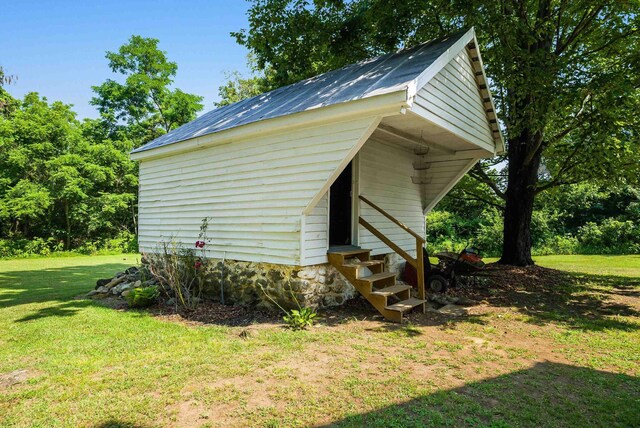 3914 Ida Rd, Luray, VA 22835 - view of side of property featuring entry steps, a yard, and a metal roof