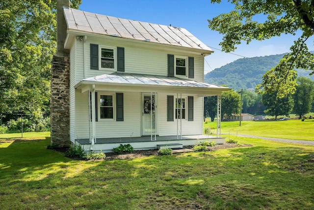 3914 Ida Rd, Luray, VA 22835 - view of front of home featuring a standing seam roof, a metal roof, covered porch, a mountain view, and a chimney