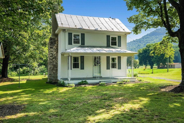 3914 Ida Rd, Luray, VA 22835 - view of front of home with a standing seam roof, a metal roof, a porch, a chimney, and a front yard