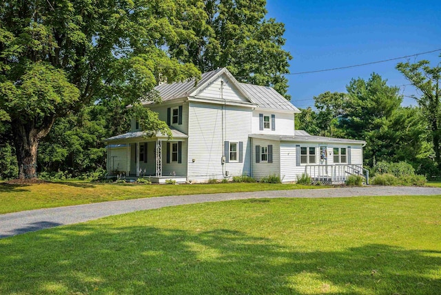3914 Ida Rd, Luray, VA 22835 - view of front of property featuring a front lawn, covered porch, a standing seam roof, and gravel driveway