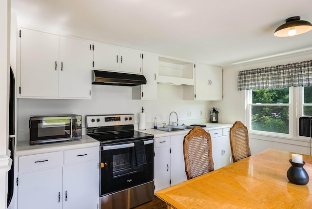 3914 Ida Rd, Luray, VA 22835 - kitchen with appliances with stainless steel finishes, under cabinet range hood, light countertops, and white cabinets