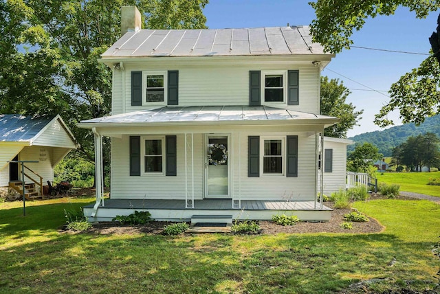 3914 Ida Rd, Luray, VA 22835 - view of front of property with a standing seam roof, a metal roof, a front yard, and a chimney