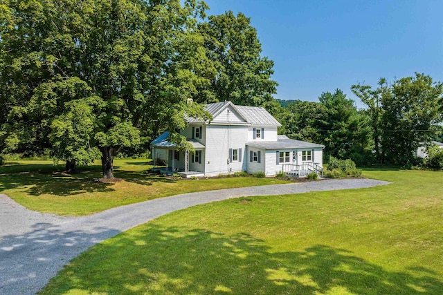 3914 Ida Rd, Luray, VA 22835 - traditional-style house featuring driveway, a front lawn, a porch, and a standing seam roof