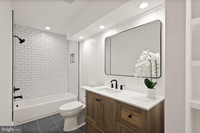  - bathroom featuring toilet, bathtub / shower combination, tile patterned floors, vanity, and recessed lighting