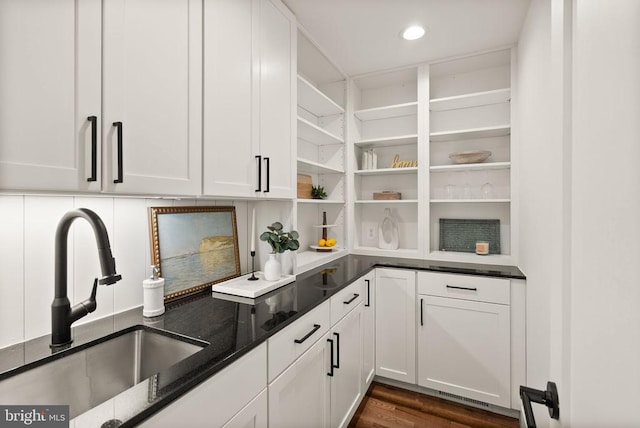  - storage area with visible vents and a sink