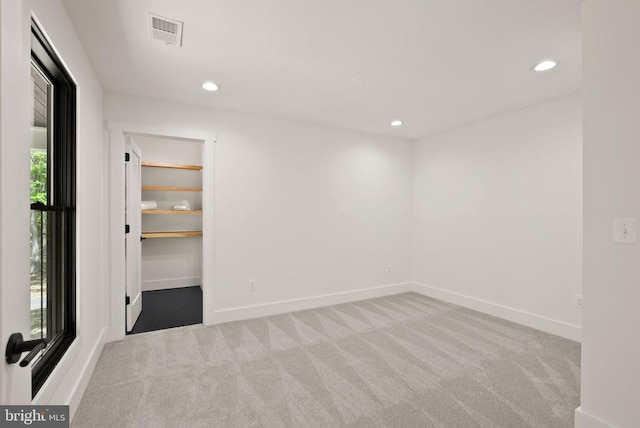  - carpeted spare room featuring baseboards, recessed lighting, and visible vents