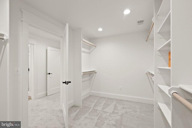  - spacious closet featuring carpet and visible vents