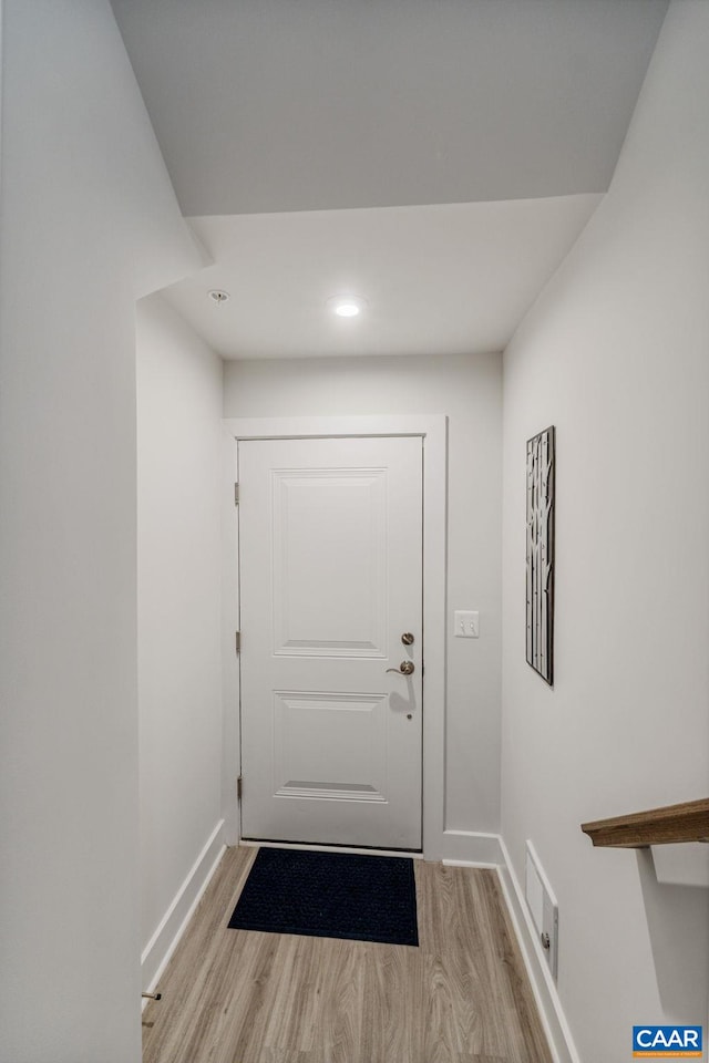 802 Wesley Ln Unit B, Charlottesville, VA 22911 - doorway with light wood-style floors and recessed lighting