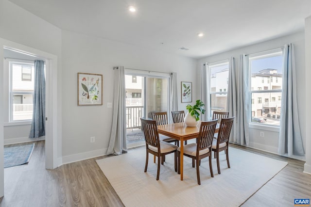 802 Wesley Ln Unit B, Charlottesville, VA 22911 - dining space featuring light wood finished floors and recessed lighting