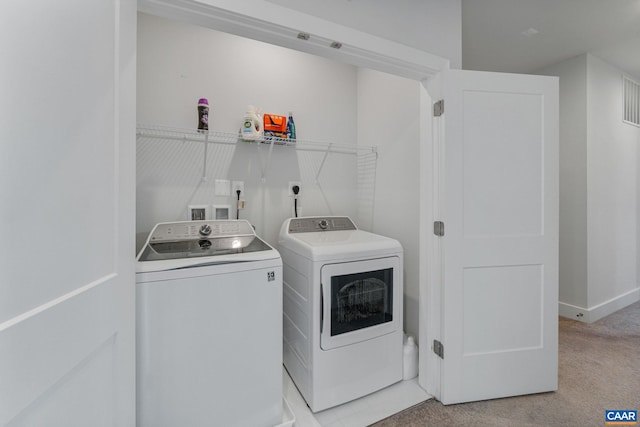 802 Wesley Ln Unit B, Charlottesville, VA 22911 - laundry room featuring washing machine and clothes dryer and light colored carpet