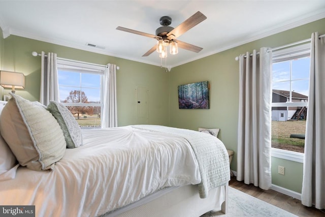 26438 Pennfields Dr, Orange, VA 22960 - bedroom featuring multiple windows, crown molding, and wood finished floors