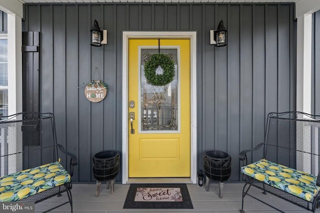 26438 Pennfields Dr, Orange, VA 22960 - property entrance with board and batten siding and covered porch