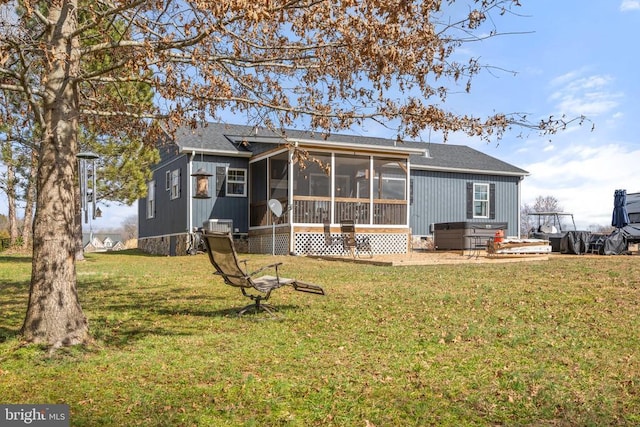 26438 Pennfields Dr, Orange, VA 22960 - back of property with a lawn, a sunroom, and a shingled roof