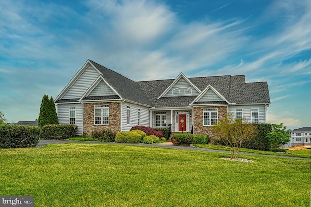79 Carrie Ct, Mineral, VA 23117 - craftsman inspired home with stone siding, a front yard, and a shingled roof