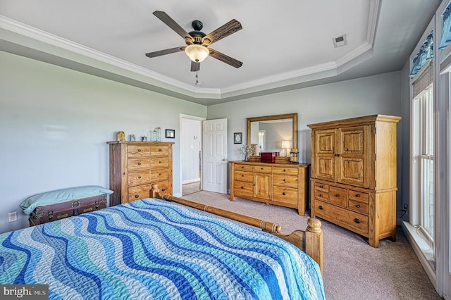 79 Carrie Ct, Mineral, VA 23117 - carpeted bedroom with multiple windows, ornamental molding, a raised ceiling, and ceiling fan