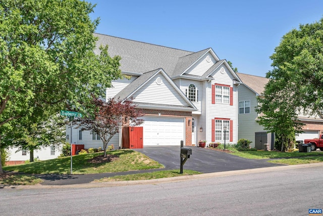 353 Bayberry Way, Charlottesville, VA 22911 - traditional-style house featuring asphalt driveway, a garage, and roof with shingles