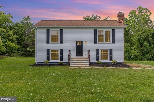 8452 Turnbull Rd, Warrenton, VA 20186 - split foyer home featuring a chimney and a front lawn