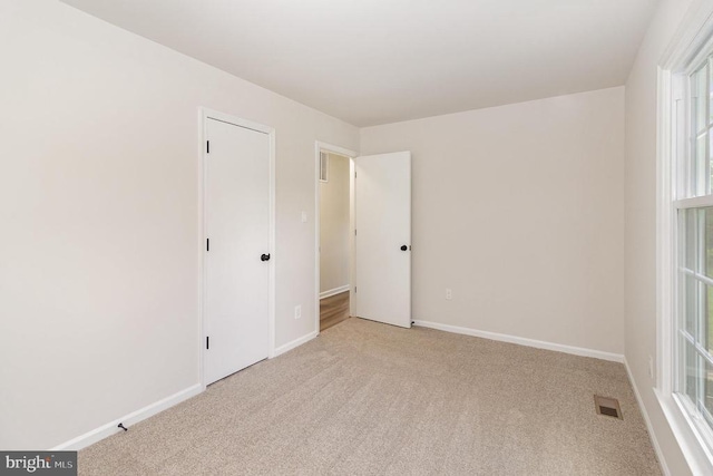 8452 Turnbull Rd, Warrenton, VA 20186 - unfurnished room featuring carpet floors, plenty of natural light, and baseboards
