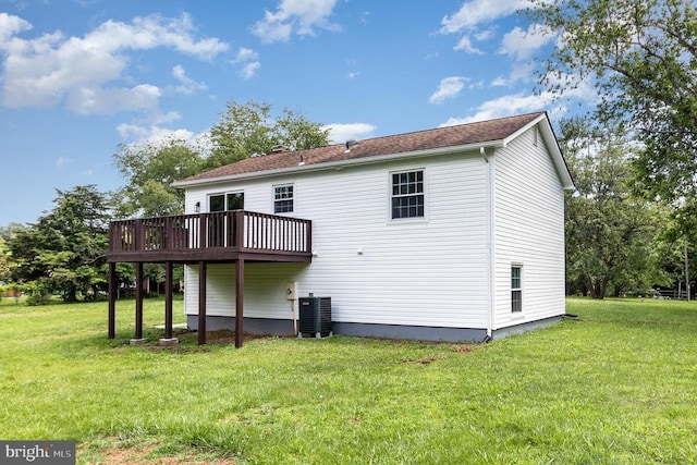 8452 Turnbull Rd, Warrenton, VA 20186 - back of house with a wooden deck, a lawn, and central AC unit