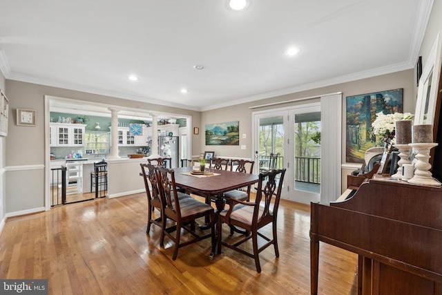 372 Daniels Rd, Barboursville, VA 22923 - dining room with french doors, crown molding, recessed lighting, light wood-style floors, and ornate columns