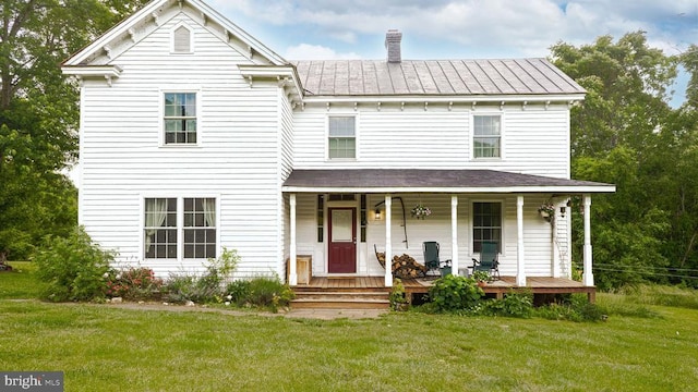 43 Briar Patch Ln, Boston, VA 22713 - view of front of home featuring a front yard, covered porch, a standing seam roof, and metal roof