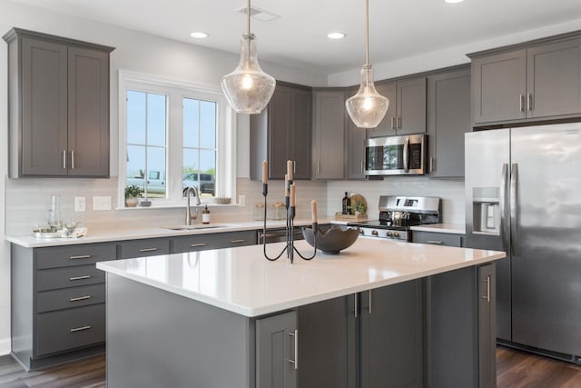 2779 Rutlege Rd Unit 194, Rockingham, VA 22801 - kitchen featuring stainless steel appliances, decorative backsplash, an island with sink, light countertops, and recessed lighting