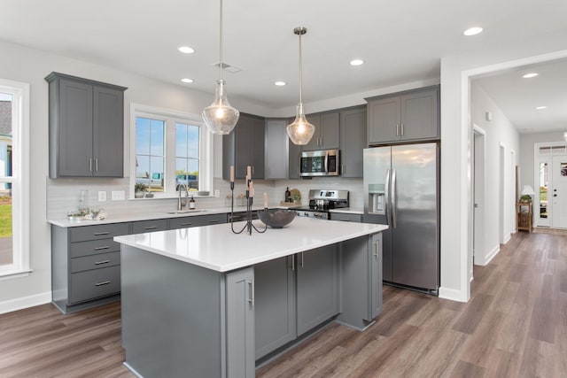 2779 Rutlege Rd Unit 194, Rockingham, VA 22801 - kitchen with stainless steel appliances, gray cabinetry, a kitchen island, dark wood finished floors, and recessed lighting