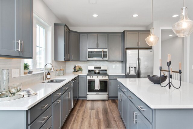 2779 Rutlege Rd Unit 194, Rockingham, VA 22801 - kitchen featuring appliances with stainless steel finishes, gray cabinets, dark wood-style flooring, recessed lighting, and backsplash