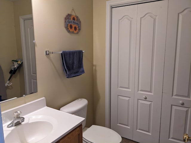 2295 New Market Depot Rd, New Market, VA 22844 - bathroom with toilet, vanity, and a closet