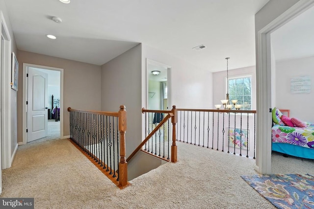 641 Keswick Dr, Culpeper, VA 22701 - corridor with an upstairs landing, carpet, a chandelier, baseboards, and recessed lighting