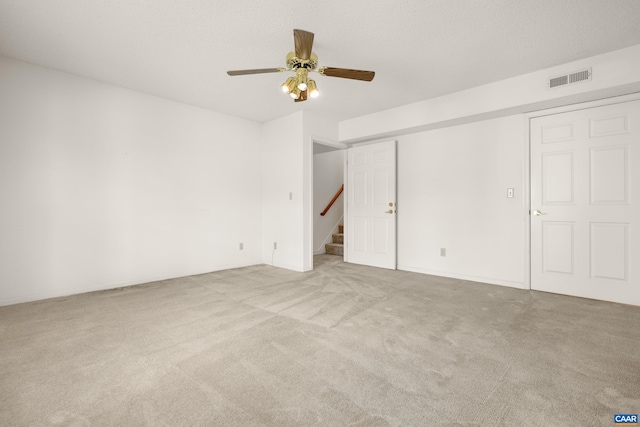1184 Partridge Ln, Charlottesville, VA 22901 - empty room with ceiling fan, carpet flooring, and stairway