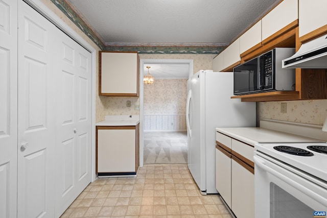 1184 Partridge Ln, Charlottesville, VA 22901 - kitchen with wallpapered walls, white appliances, custom range hood, white cabinetry, and light countertops