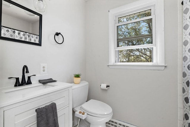 bathroom with vanity, toilet, and a shower with curtain