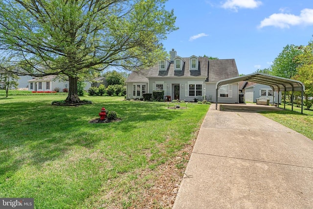 10630 Bent Tree Dr, Fredericksburg, VA 22407 - cape cod house with concrete driveway, a front yard, a detached carport, and a chimney