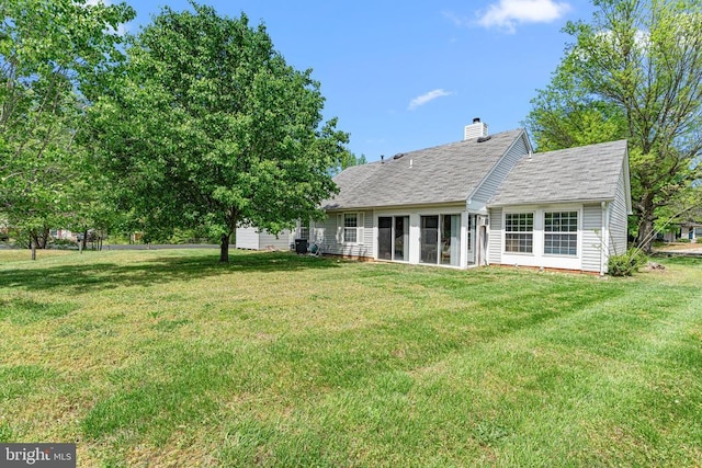 10630 Bent Tree Dr, Fredericksburg, VA 22407 - back of house with a yard and a chimney