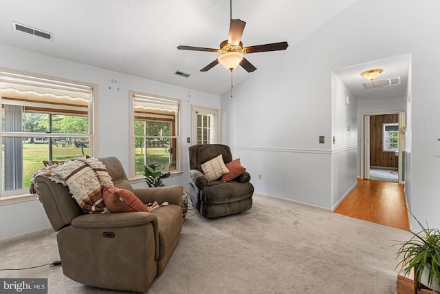 10630 Bent Tree Dr, Fredericksburg, VA 22407 - carpeted living area with vaulted ceiling, a ceiling fan, and visible vents