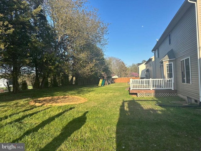 6015 Sunny Meadows Dr, Fredericksburg, VA 22407 - view of yard featuring a wooden deck and a playground