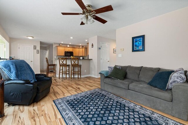 30 Beatrice Ct, Fishersville, VA 22939 - living room with light wood finished floors, a ceiling fan, and recessed lighting