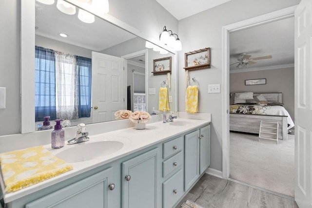 30 Beatrice Ct, Fishersville, VA 22939 - bathroom with ensuite bath, double vanity, a ceiling fan, wood finished floors, and crown molding