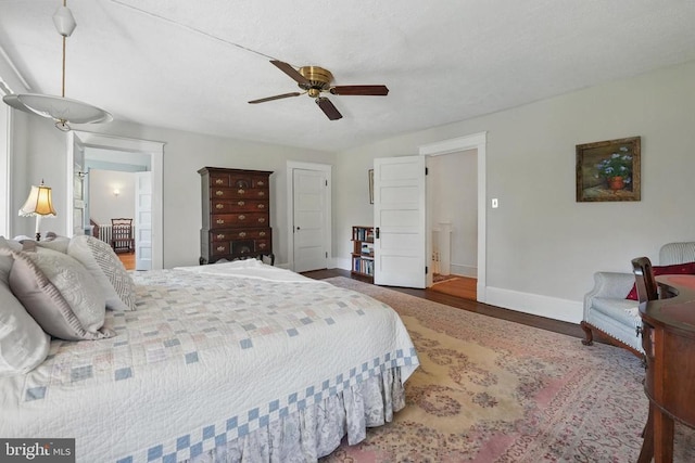 507 Winchester St, Warrenton, VA 20186 - bedroom featuring baseboards, wood finished floors, and ceiling fan